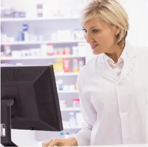 woman pharmacist working on a computer